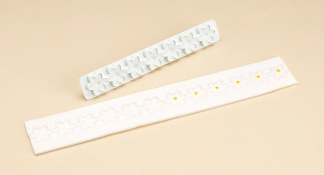 Bordutstikker blomst 2.5x15cm . 